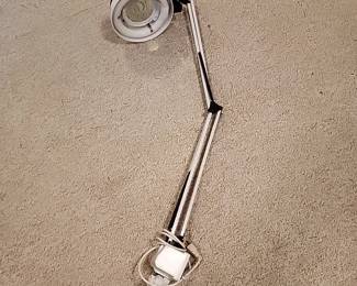 Articulated Arm Industrial magnifying lamp with a 120v outlet
