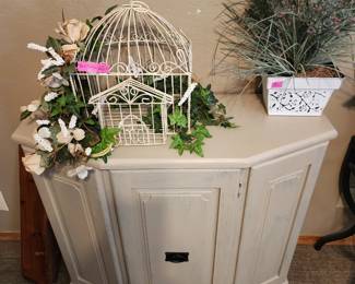Small cabinet and bird cage