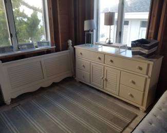 Queen bed: footboartd detail; 6-drawer dresser; table lamps