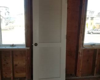 Louvered door