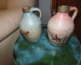 Two hand painted antique clay jugs.