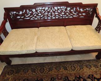 Asian Rosewood furniture. Highly carved back rests and silk cushions.