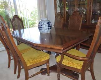Formal dining set, extra leaves and six chairs with matching china hutch.