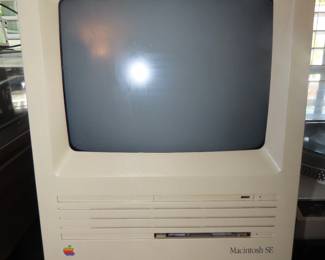 Vintage 1980 Apple Mac computer with keyboard and mouse. 50 years old this year