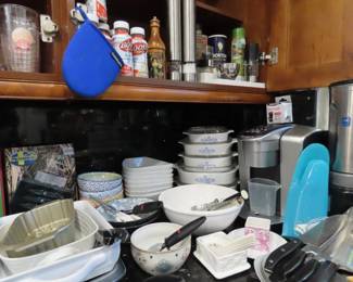 Corningware casseroles, Kuerig, Pyrex, bakeware, utensils.
