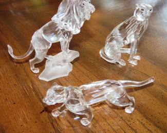 Swarovski crystal lion, panther and cheetah figurines.