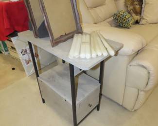 Modern end table with power and USB ports.