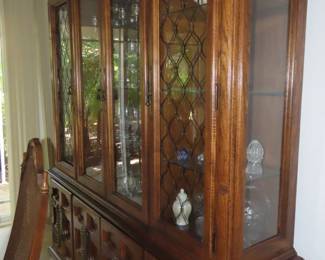 Formal dining set, extra leaves and six chairs with matching china hutch.
