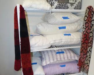 Pillows, blankets and comforters.