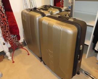 Two soft sided suitcases.