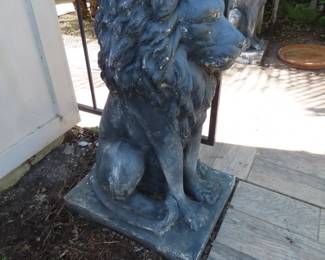 Two lion statues.