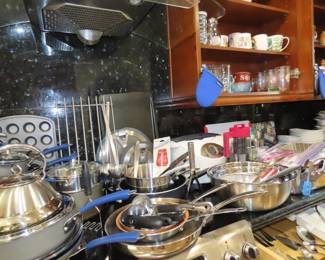 Cookware, bakeware, mixing bowls, lots of new kitchen items.