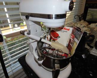 Brand new KitchenAid Mixer with utensils.