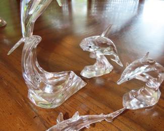 Swarovski crystal shark and dolphins.