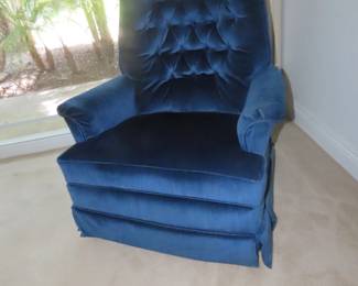 Blue velvet Swivel recliner.