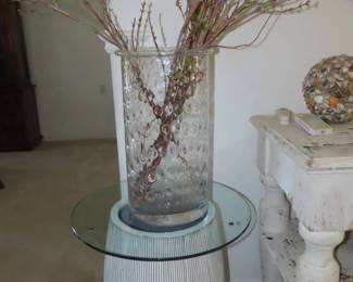 large glass jar and willow stems.