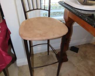One of two tall bar stools.