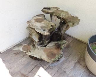 Large tree root/trunk plant stand.