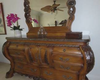 Large marble top chest with matching mirror.
