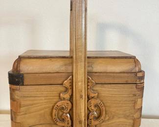 Handcrafted Wooden Basket with Intricate Carved Details and Lid