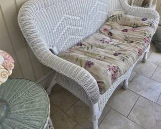 White wicker loveseat and tables