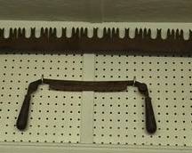 Antique cross saw and draw knife