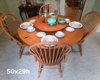 Round pine table with lazy susan and 4 oak chairs