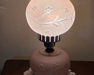 Pair of frosted pink hurricane lamps