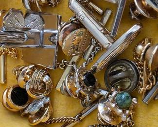 Various pieces of men's jewelry