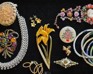Various pieces of vintage costume jewelry