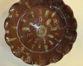 Fluted decorated pottery dish