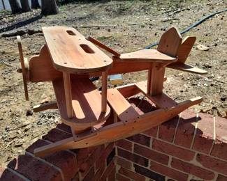 Wooden children's rocking toy