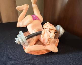 Humorous Old Man Exercising Figurine