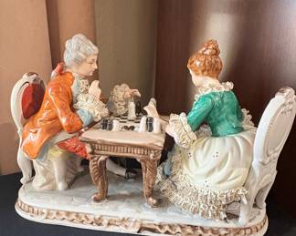 Porcelain Figurine of a Couple Playing Chess