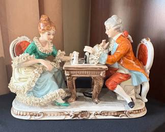 Porcelain Figurine of a Couple Playing Chess