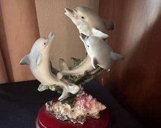 Family of Dolphins Sculpture on Coral Base
