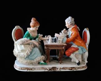 Porcelain Figurine of a Couple Playing Chess