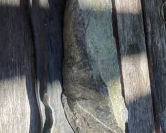 Carved Stone Sculpture with Metal Stand