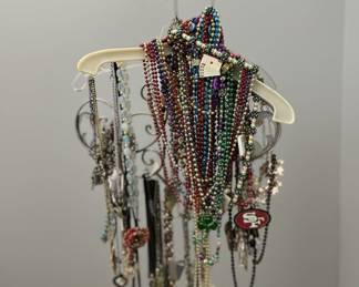 Assorted Costume Jewelry Collection with Mardi Gras Beads and Themed Pendants