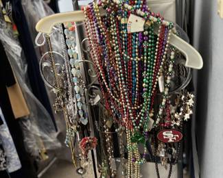 Assorted Costume Jewelry Collection with Mardi Gras Beads and Themed Pendants