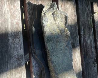 Carved Stone Sculpture with Metal Stand