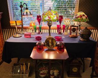 A concentrated grouping of Tiffany-style lighting, with multiple examples presented together.