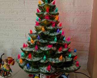 Large ceramic Christmas tree with birds and its star. 