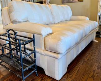 SOLD - Faux bamboo magazine rack in matte black wit gold accents - 19x7x18; $550 - Down filled 2 cushioned oyster striped couch - 67x37.5x30