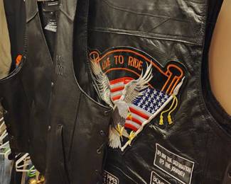 Leather vests with patches and Harley logo