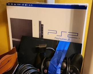Playstation 2 system with accessories and games