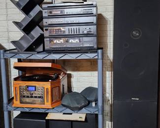 Magnavox stereo and speakers, Crosley turntable unit, Harmon Kardon subwoofer, other RCA speakers, disc holders