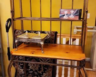 Beautiful baker's rack, long wool rugs behind