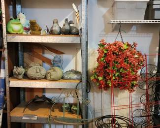 More yard decor: plant stands, shepherd hooks, frogs, base rocks, picnic canopy