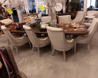 dinning room table, 10 chairs with 24 in leaf